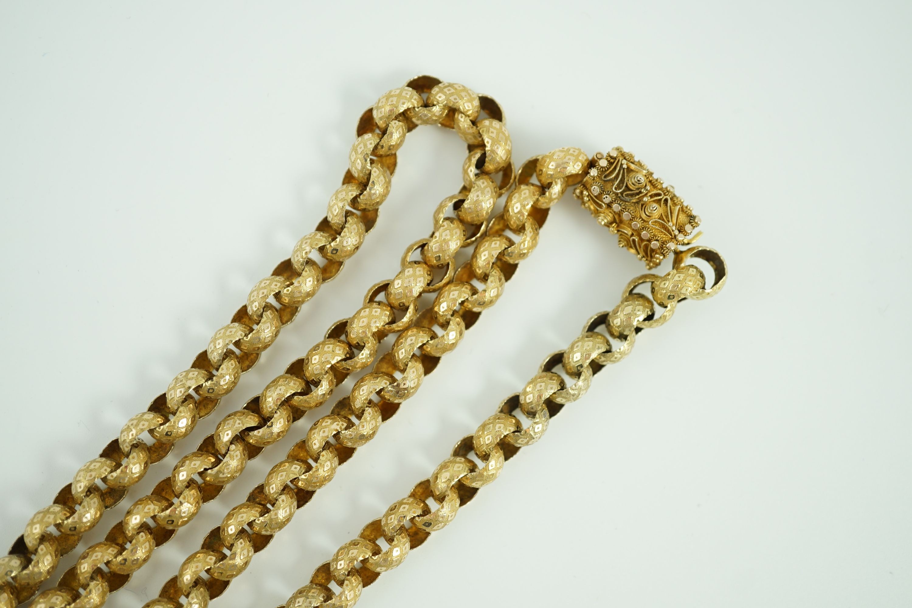 An early 19th century gold muff chain